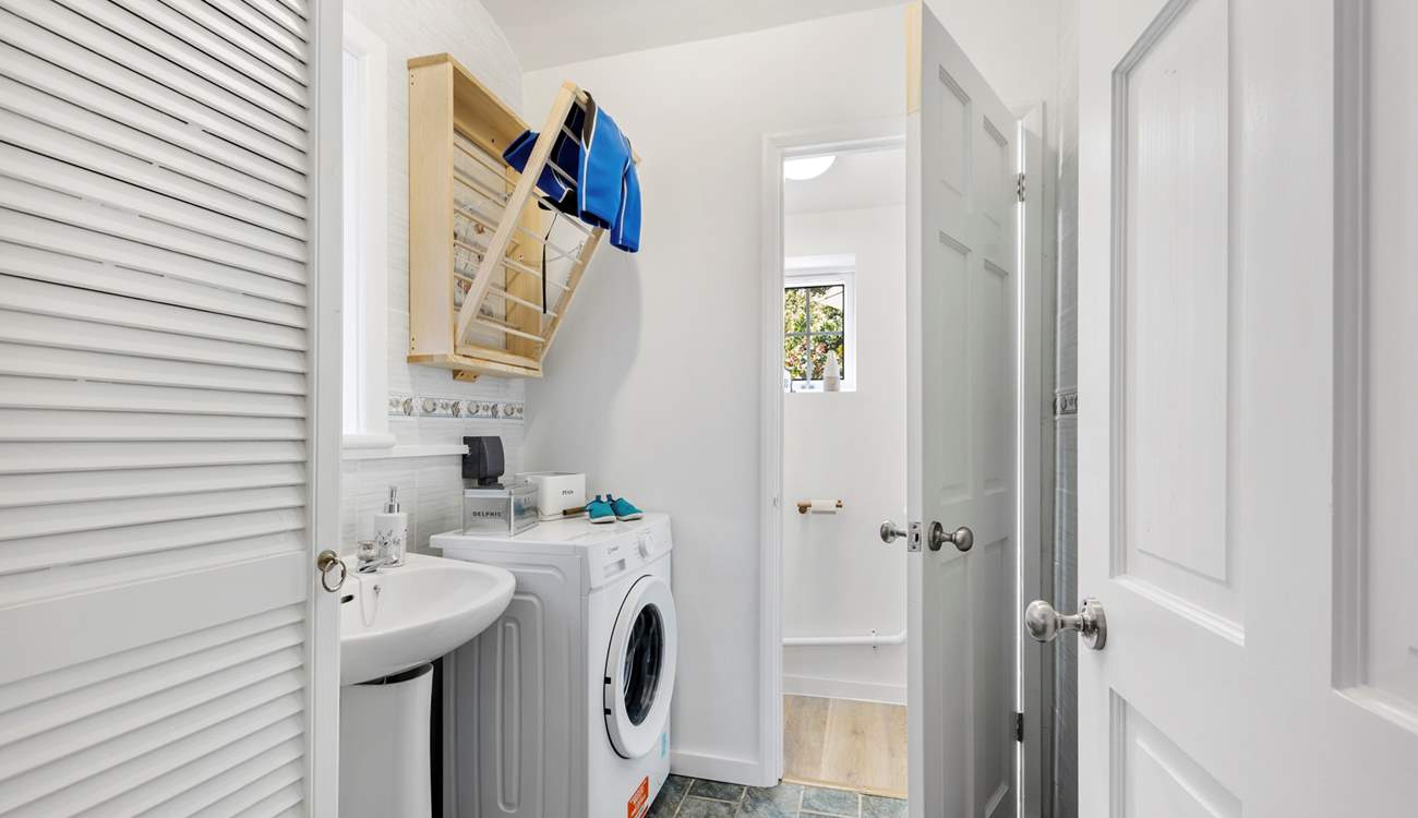 Off the kitchen is a large utility-room and WC. Very handy for drying wetsuits and dogs perhaps?