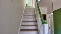 Venturing upstairs you will find two beautifully styled bedrooms.