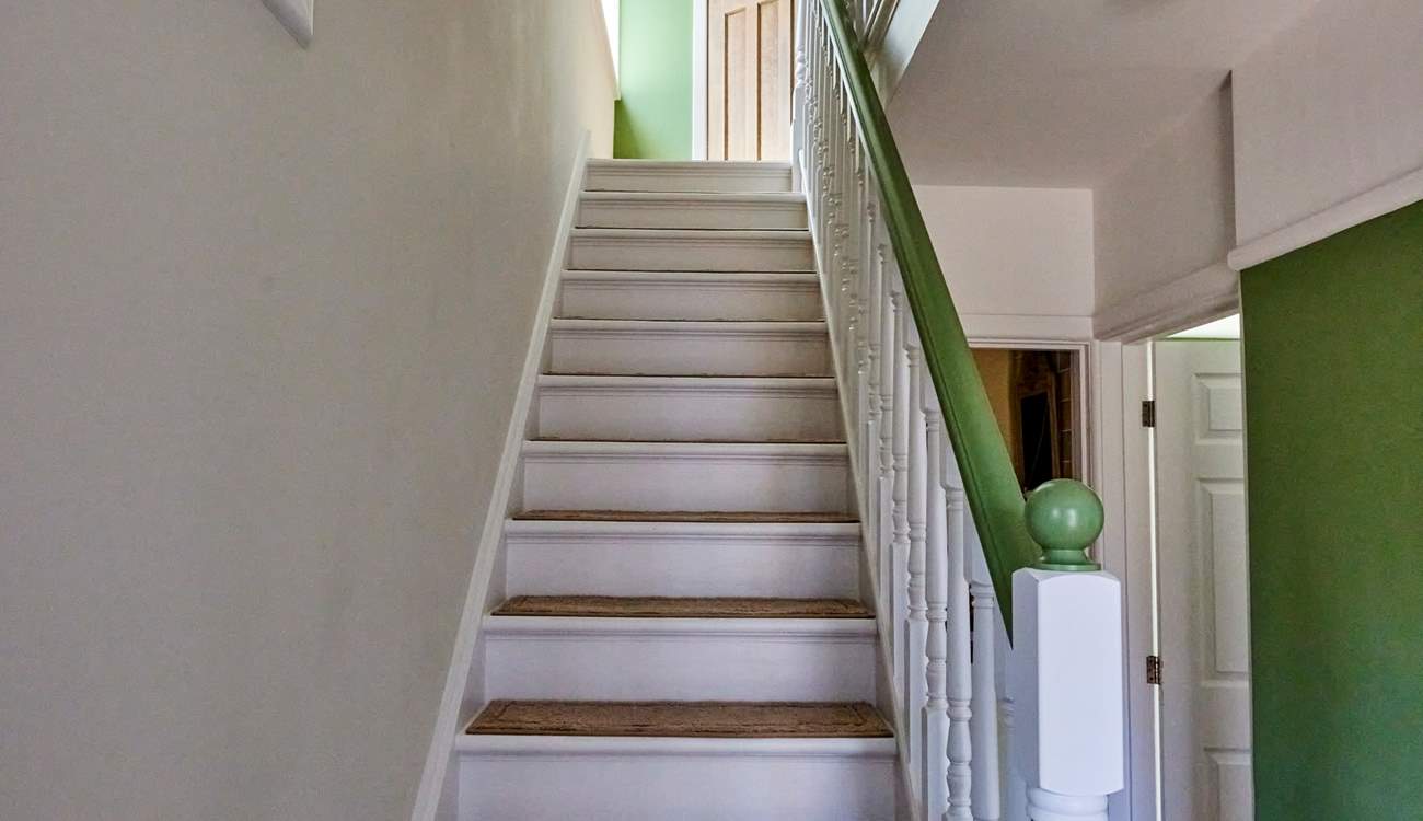 Venturing upstairs you will find two beautifully styled bedrooms.