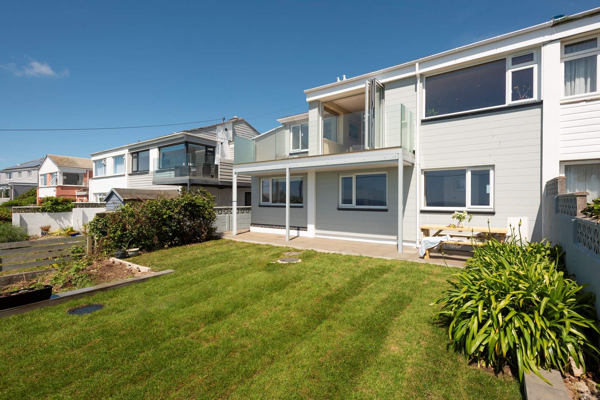 Horizons is set over two floors, the kitchen/diner upstairs has bi-fold doors and a balcony.
