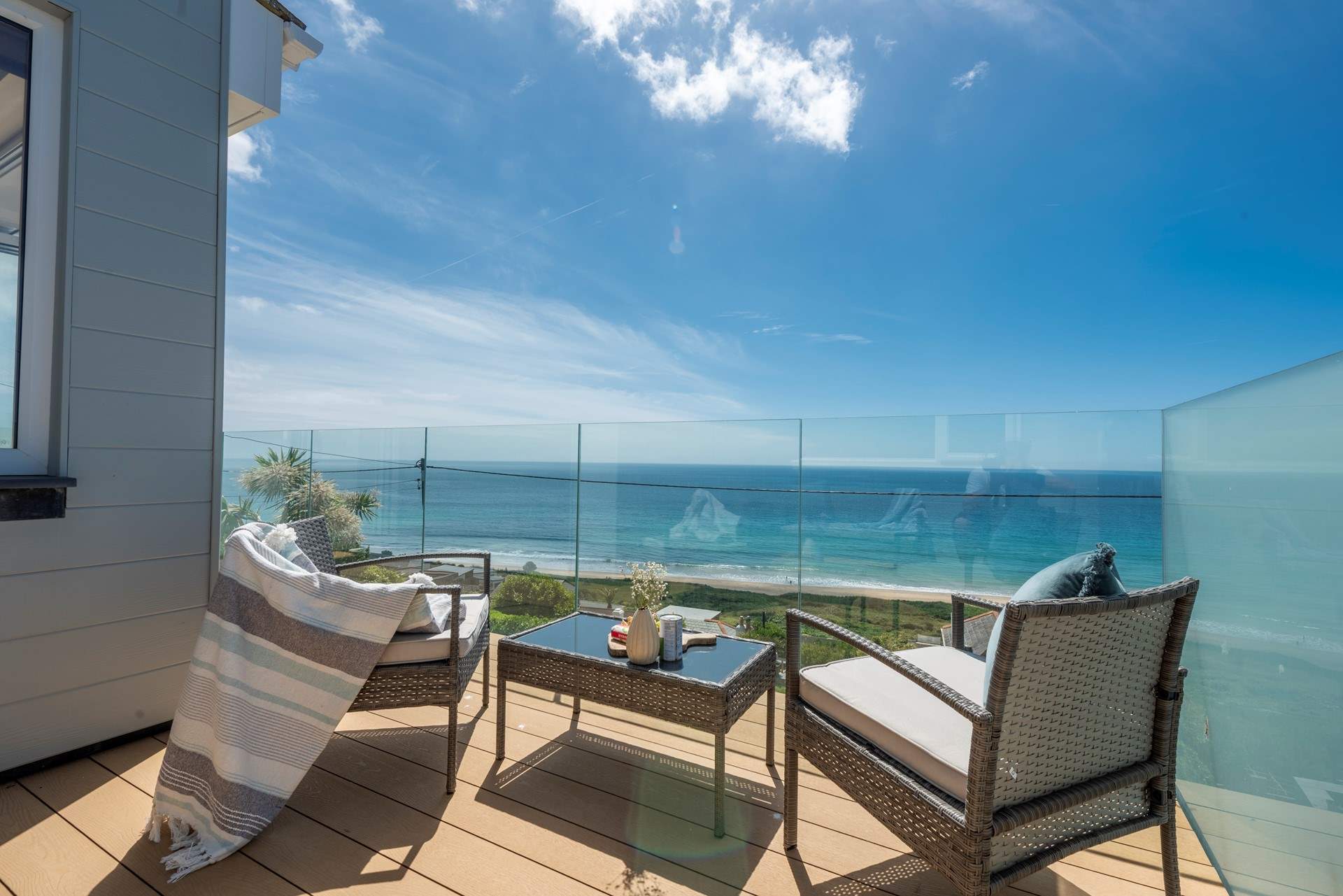 Take in the sweeping views on the balcony with a glass of wine.