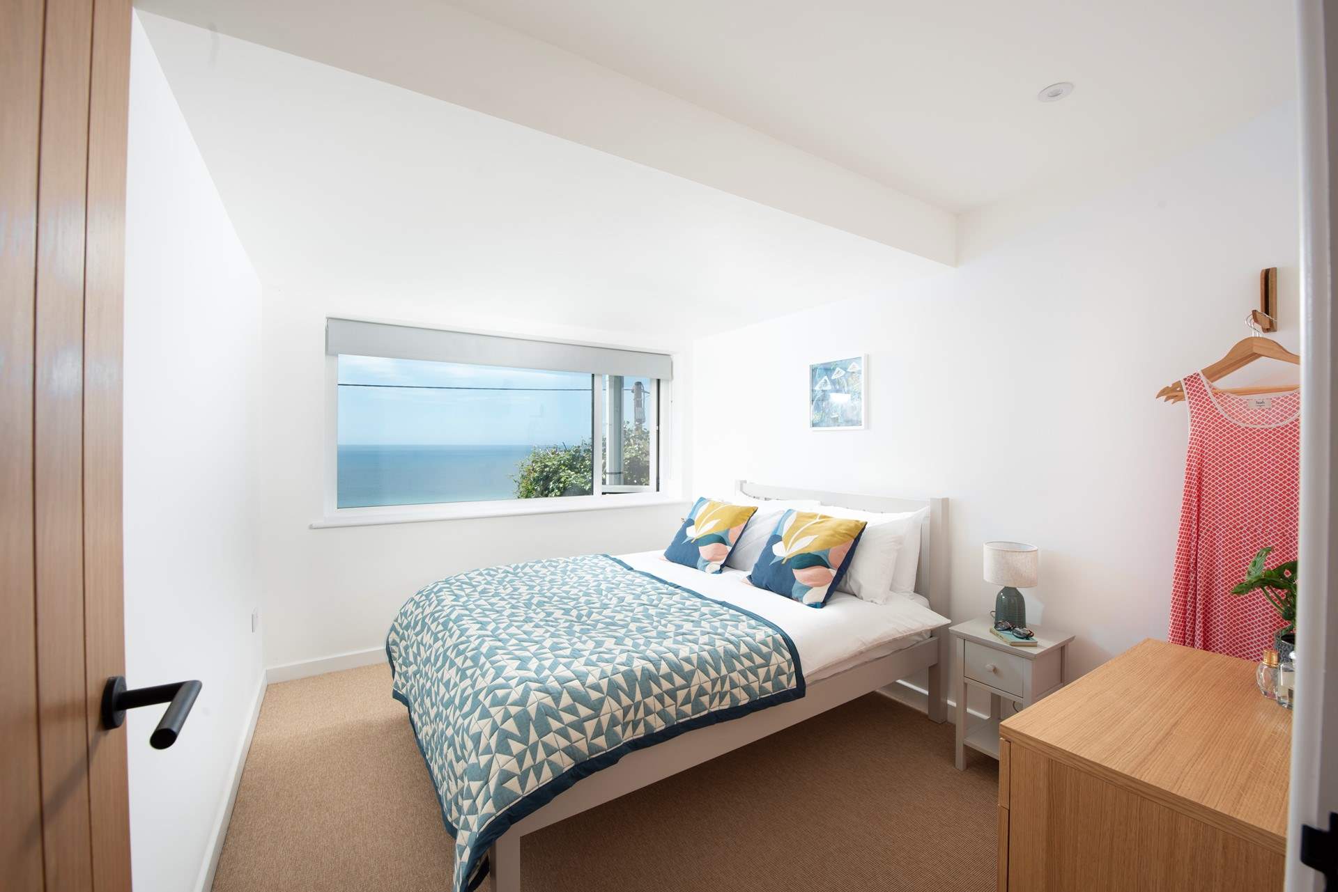 Bedroom 3 with more sea and garden views.