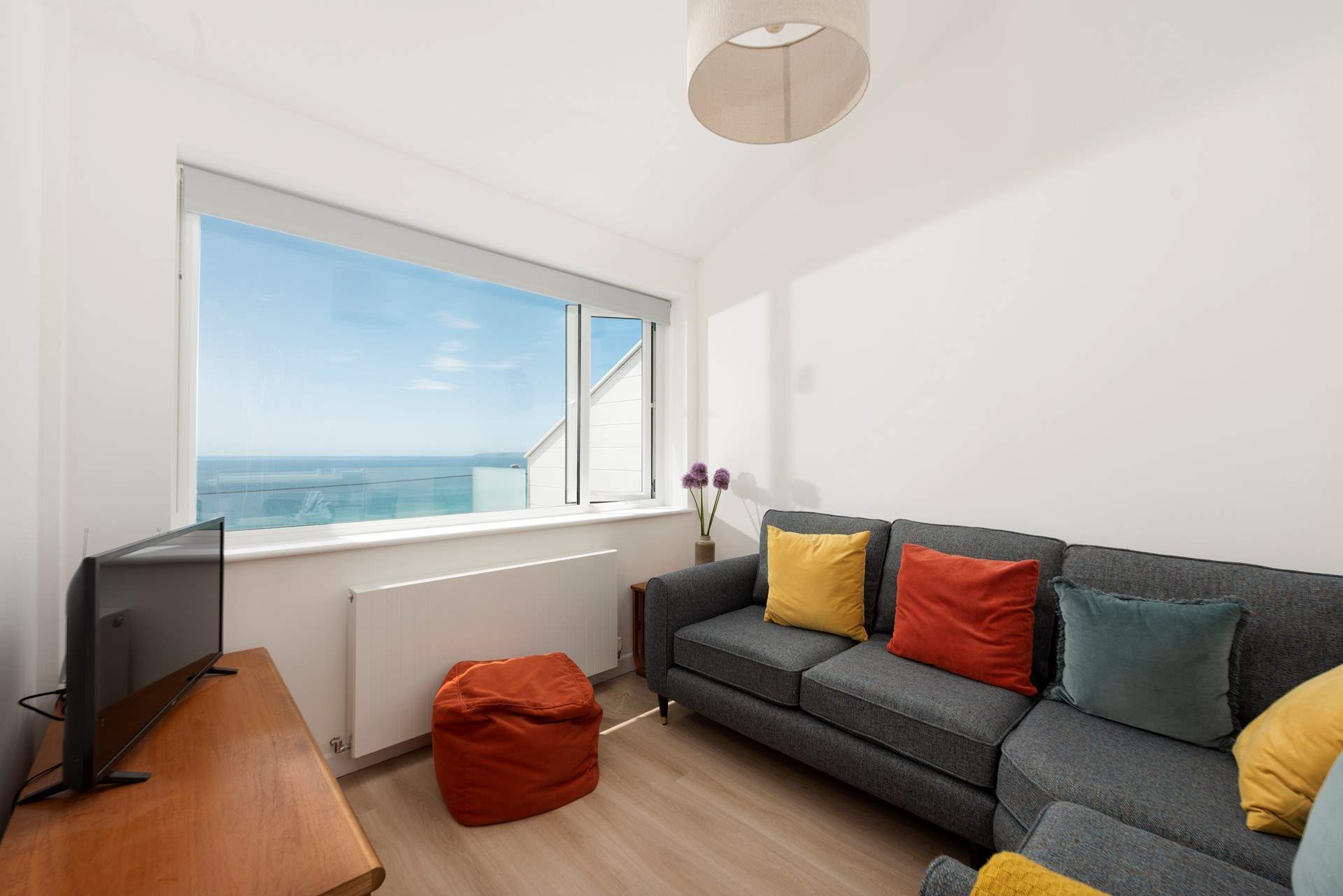 The sitting-room has a Smart TV.