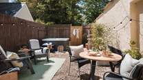The sunny courtyard has plenty of seating options.