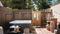 Relax into your surroundings in the bubbling hot tub.