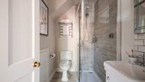 The shower-room is also decorated in neutral tones.