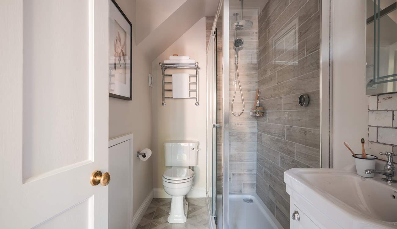 The shower-room is also decorated in neutral tones.