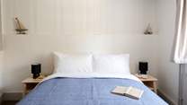 Bedroom two is a skilful example of careful styling that creates a quite blissful space to rest your head.