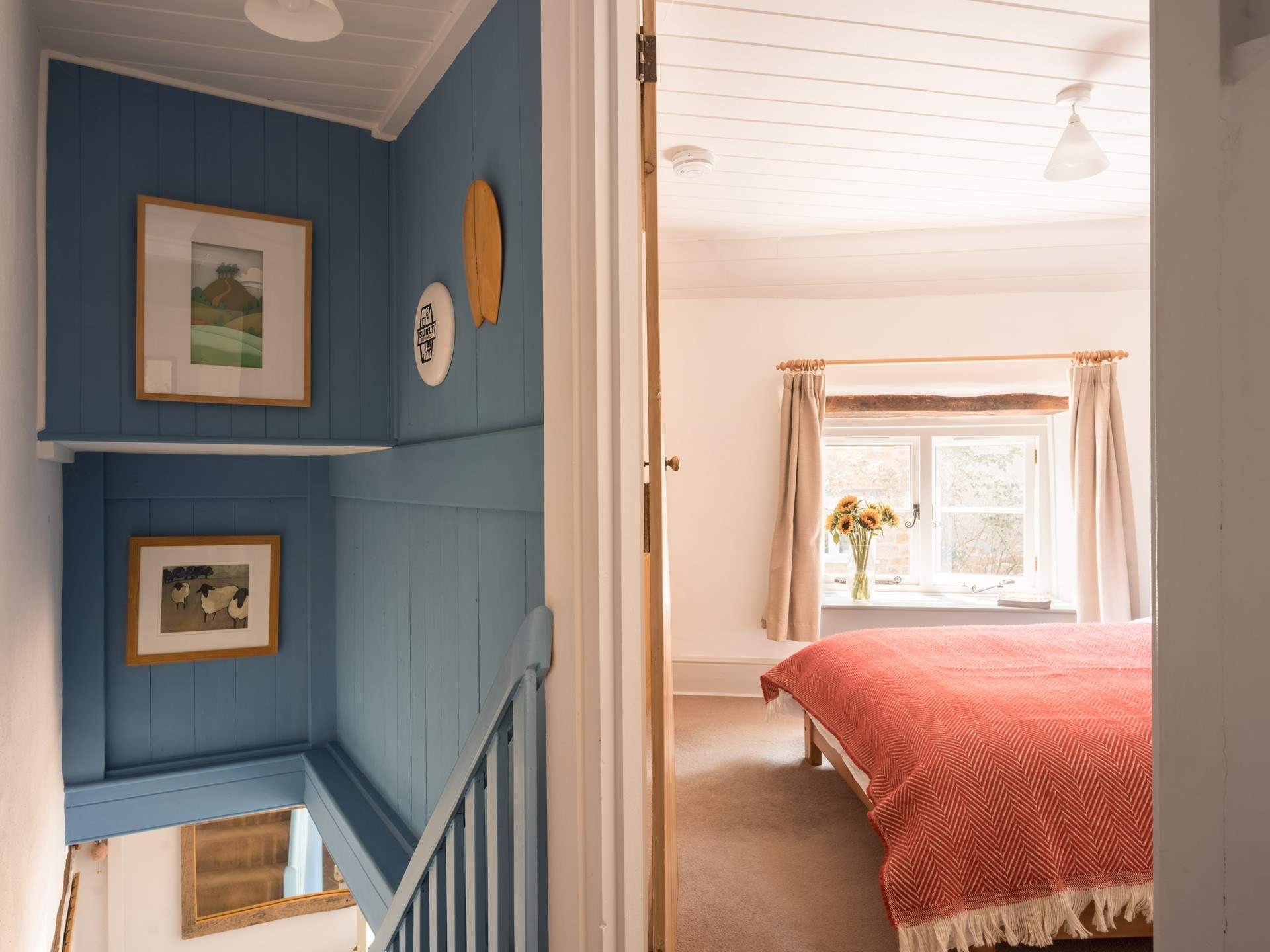 Venturing upstairs you will find the coastal styling continues as you discover the bedrooms...