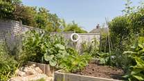 Clever landscaping creates shape and points of interest around every turn.