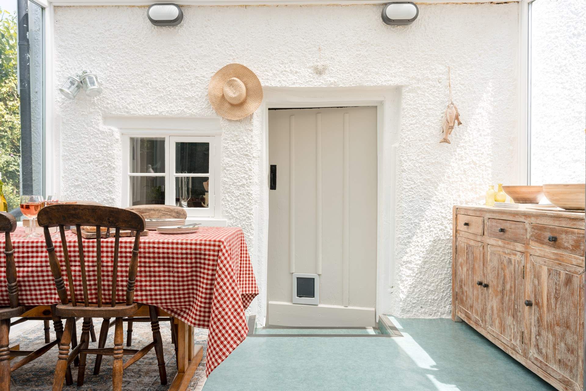 The sun-room is a triumph - surrounded by the landscaped gardens and just the most intimate and inspiring place to gather with your guests for some feasting and socialising.