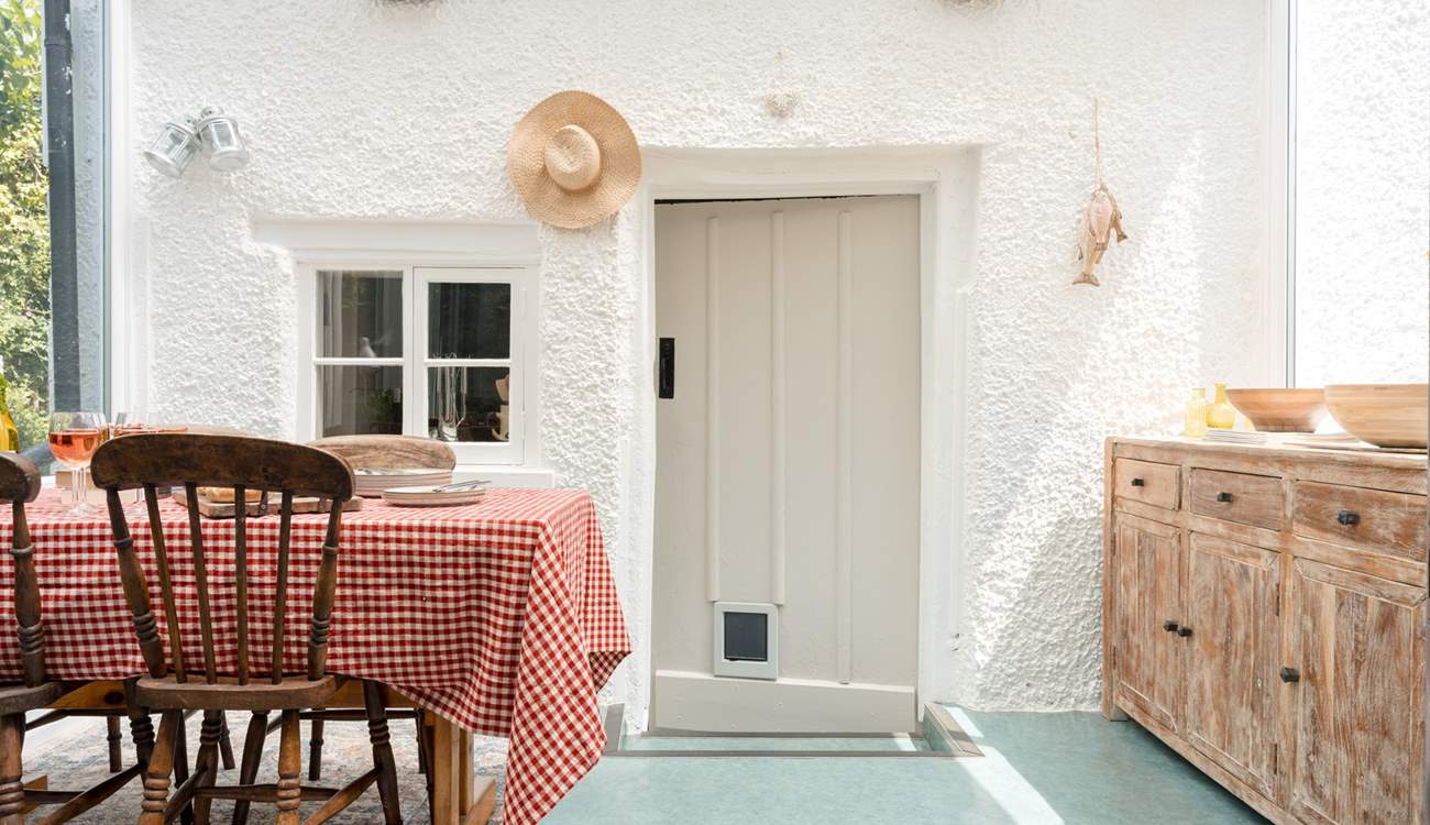 The sun-room is a triumph - surrounded by the landscaped gardens and just the most intimate and inspiring place to gather with your guests for some feasting and socialising.
