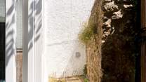 A few spots for your bikes are tucked behind the sun-room and there is a separate access gate to the garden for ease.