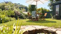 The elevated garden allows for some lovely views over the thatched roof tops of the village. Just note there is a small uncovered pond.