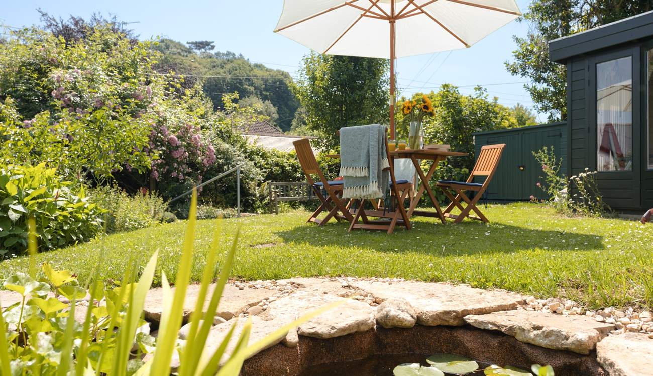 The elevated garden allows for some lovely views over the thatched roof tops of the village. Just note there is a small uncovered pond.