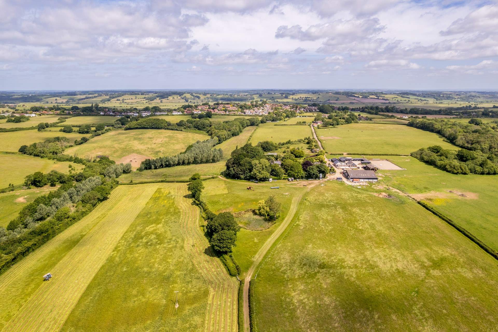 Icklesham sits on the edge of the High Weald National Landscape (formerly an Area of Outstanding Natural Beauty).