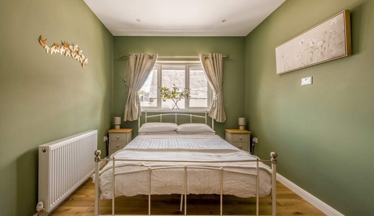 Bedroom 1 is a relaxing haven.