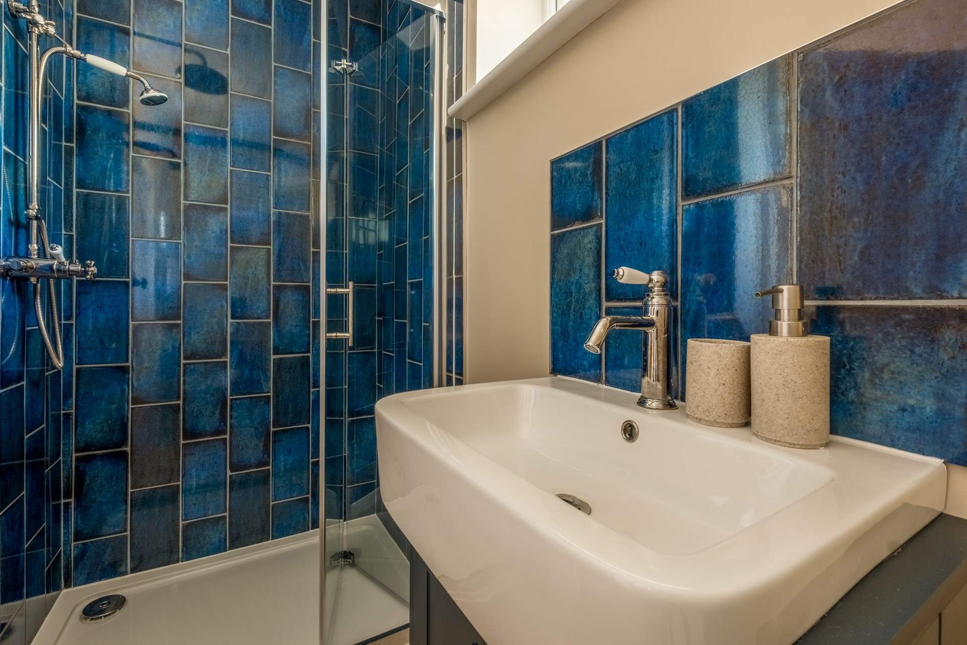 The twin room sits near to this shower-room.