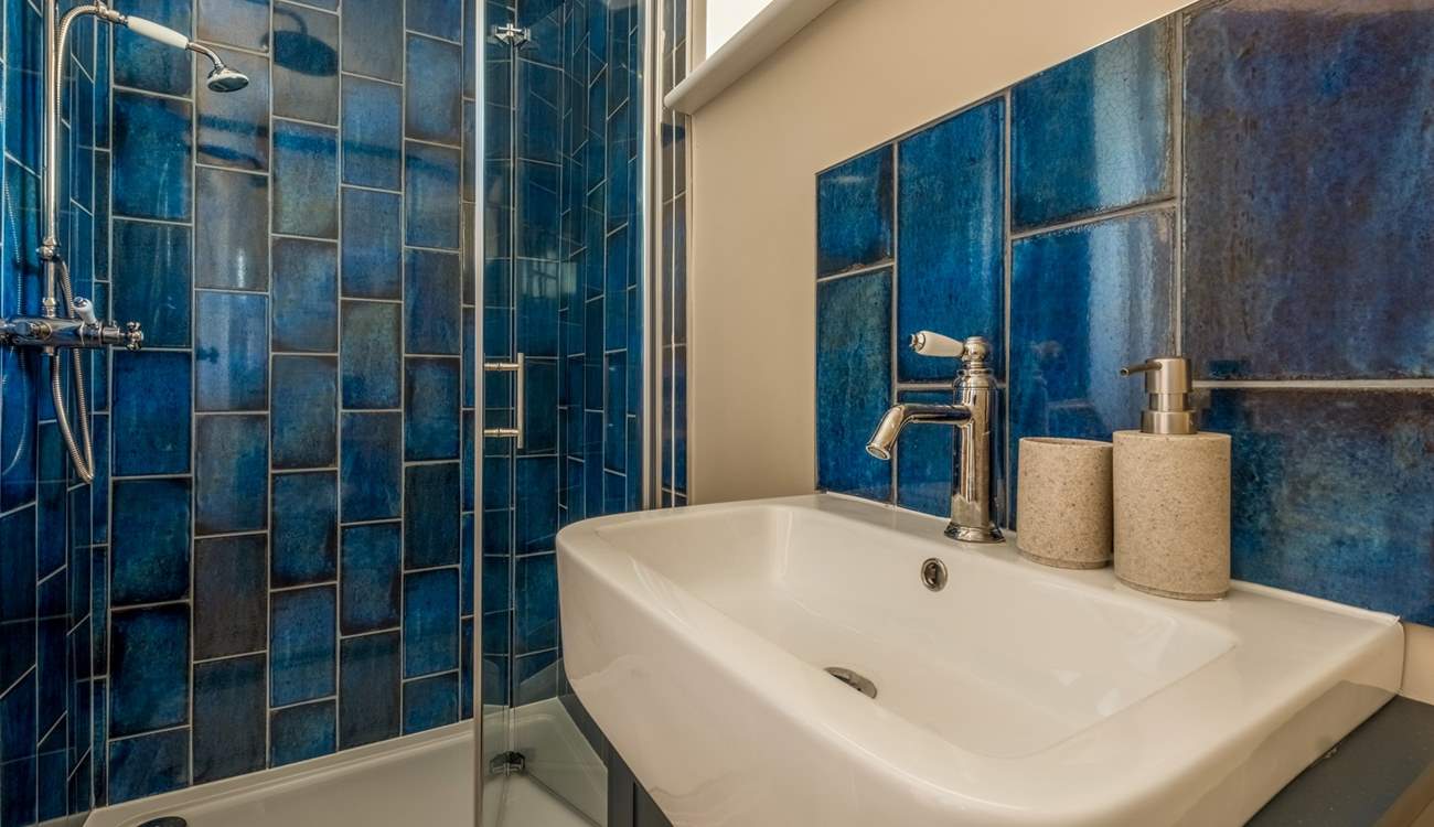 The twin room sits near to this shower-room.
