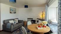 Return after a day's exploring to relax on the sofas. Watch your favourite movie or play board games around the table. 