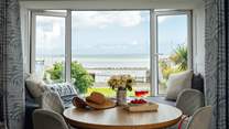 Soak up the beach views from this sweet seaside apartment. 