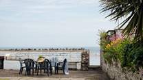The perfect spot for sunny breakfasts or listening to the sea gently lapping on the shore on a still summer's night. 