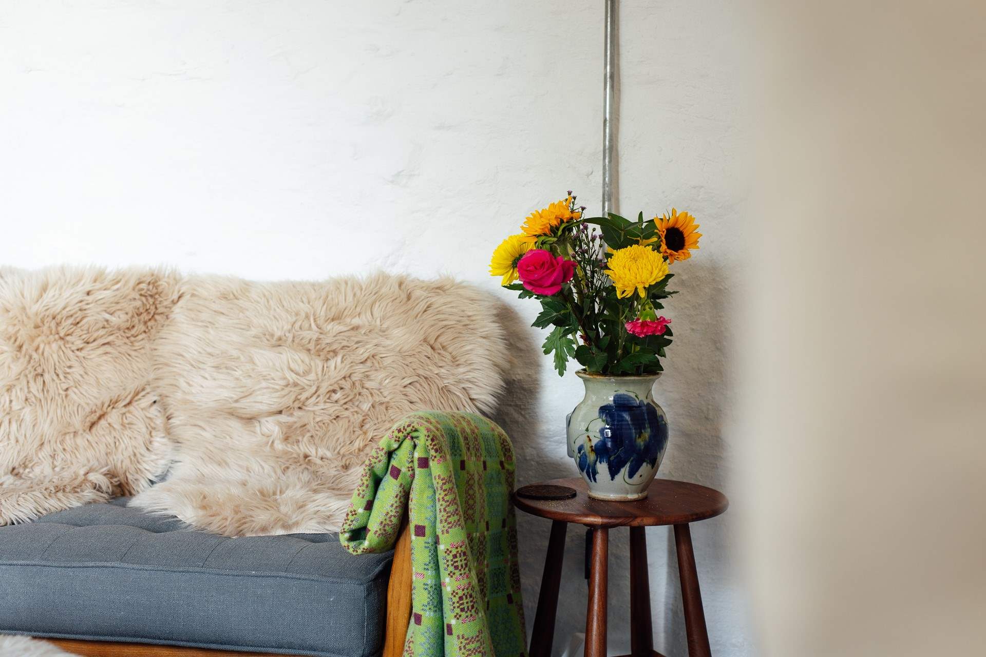 Relax on the sofa next to the wood-burner in the cwtch. 
