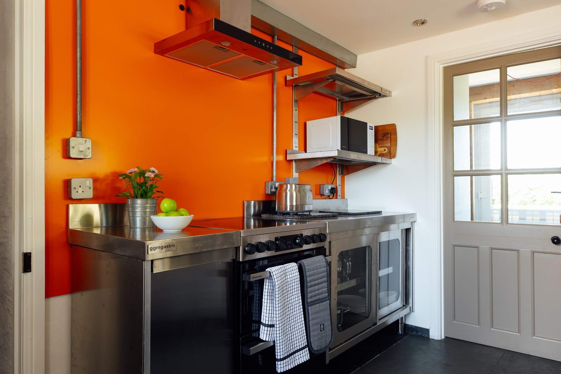 Through the kitchen you will find the ground floor shower-room, utility-room and access to the enchanting large patio-area, overlooking the meadows, with a wood-fired hot tub and sauna. 