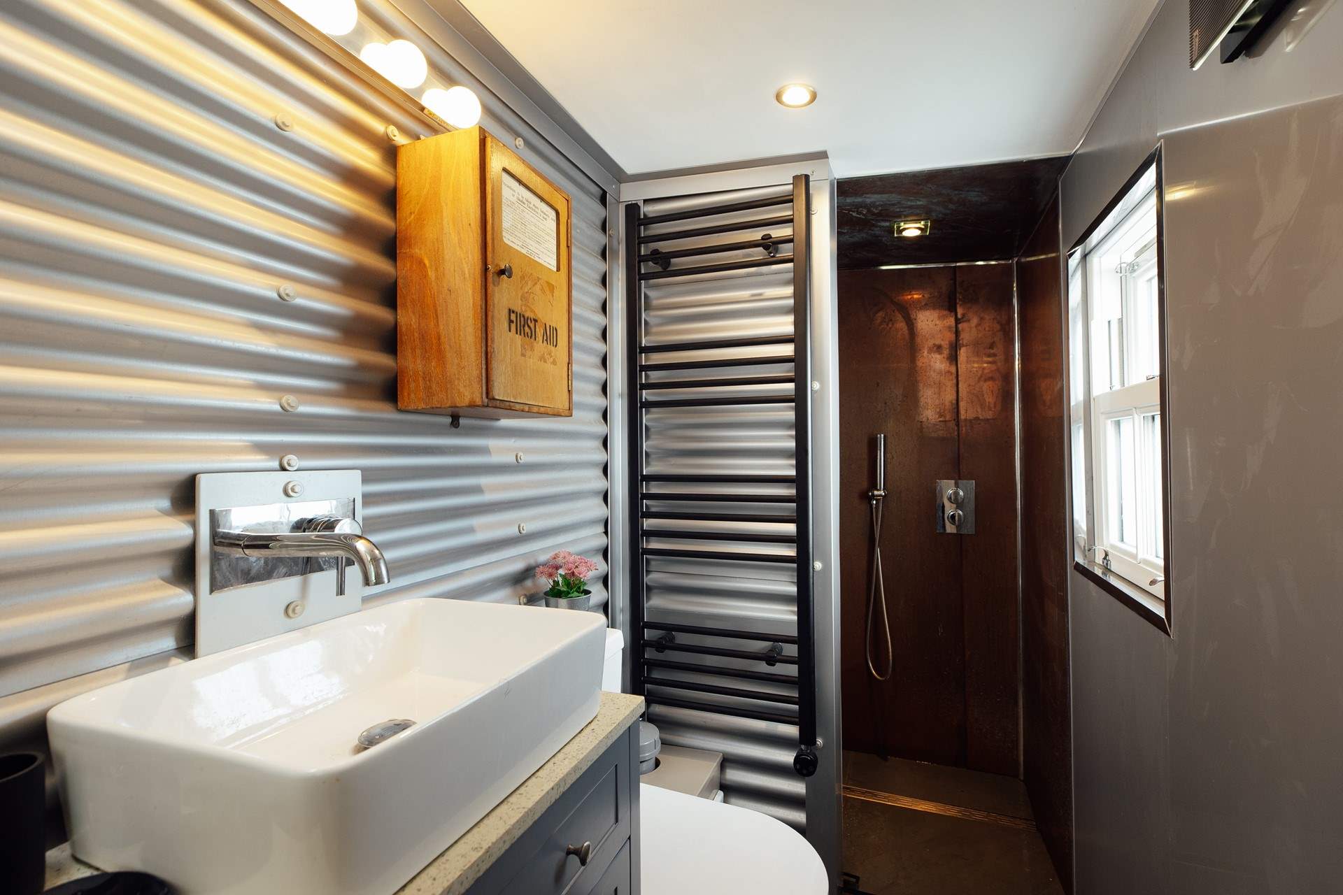 The ground floor shower-room. A unique characterful space, offering rustic charm blending history with modern day comforts. 