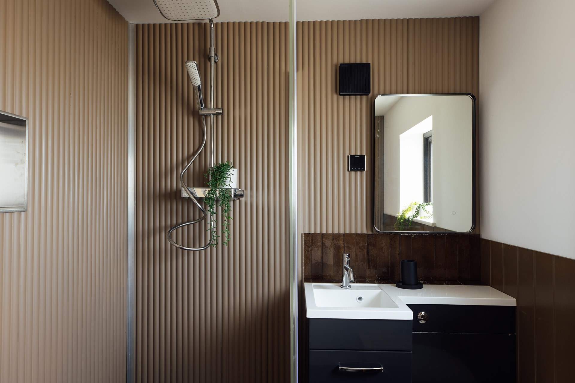 Luxurious ground floor bathroom with under-floor heating and a deep tub.