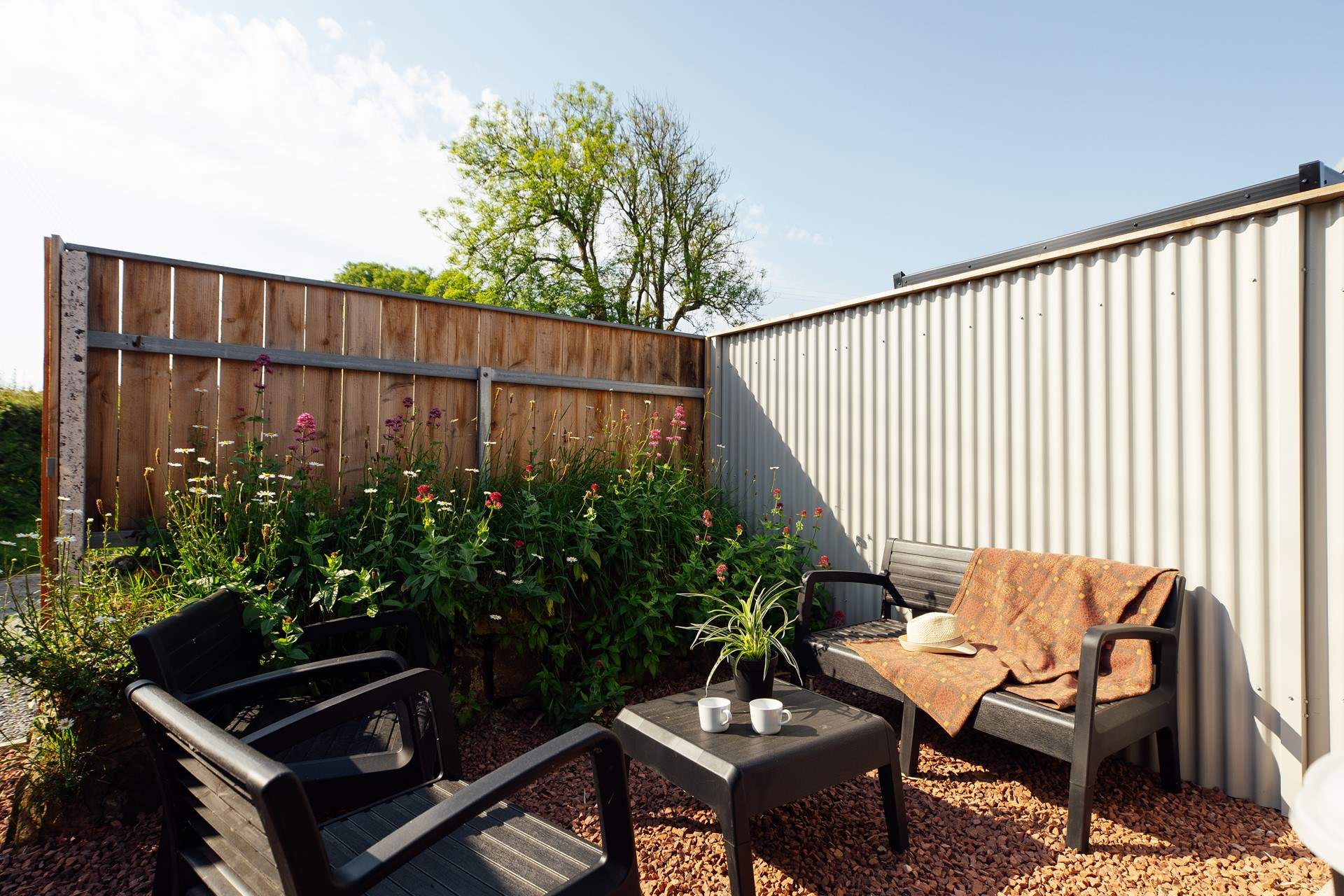 Idyllic spot for a morning coffee or a sundowner beneath the dark skies. 