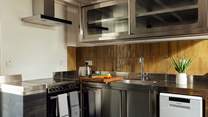 The holiday chef will be in their element in the sleek, contemporary. well-equipped kitchen in Canol. 