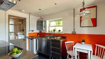 The chef will love the contemporary, bright kitchen in Nol, which leads in to the utility-room, shower-room and large patio-area with hot tub and sauna. 