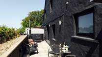 The perfect sunny patio in Nol. A wood-fired hot tub at one end and a sauna, the other. Bliss. 