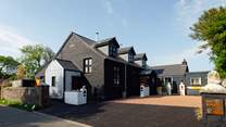 Welcome to Out West Pembrokeshire. Ideal for larger groups, accommodating thirteen, in seven bedrooms, across three cottages, Blaen, Nol and Canol.