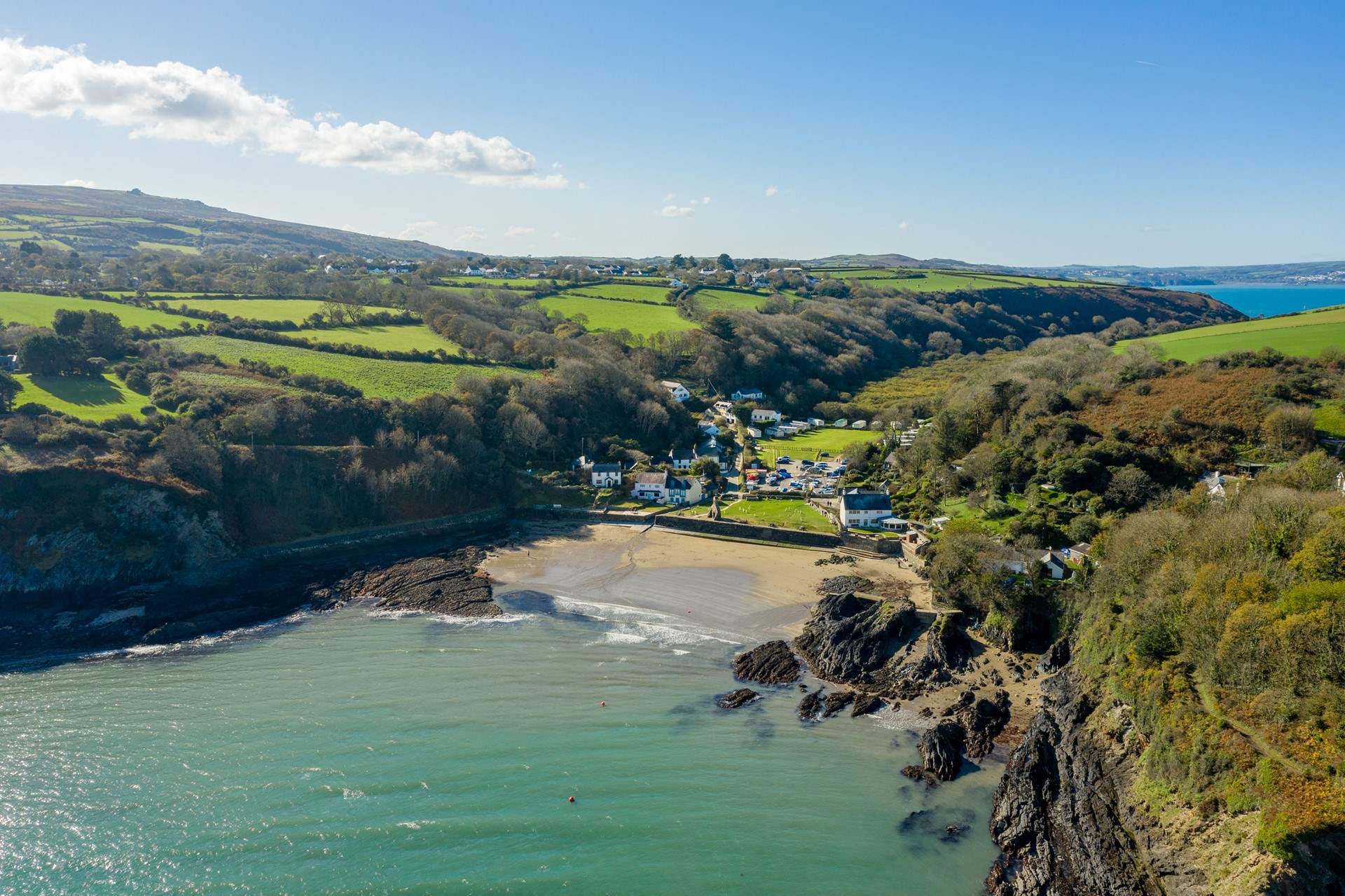 Stroll the leafy lanes to the sheltered, pretty cove at Cwm yr Eglwys. 