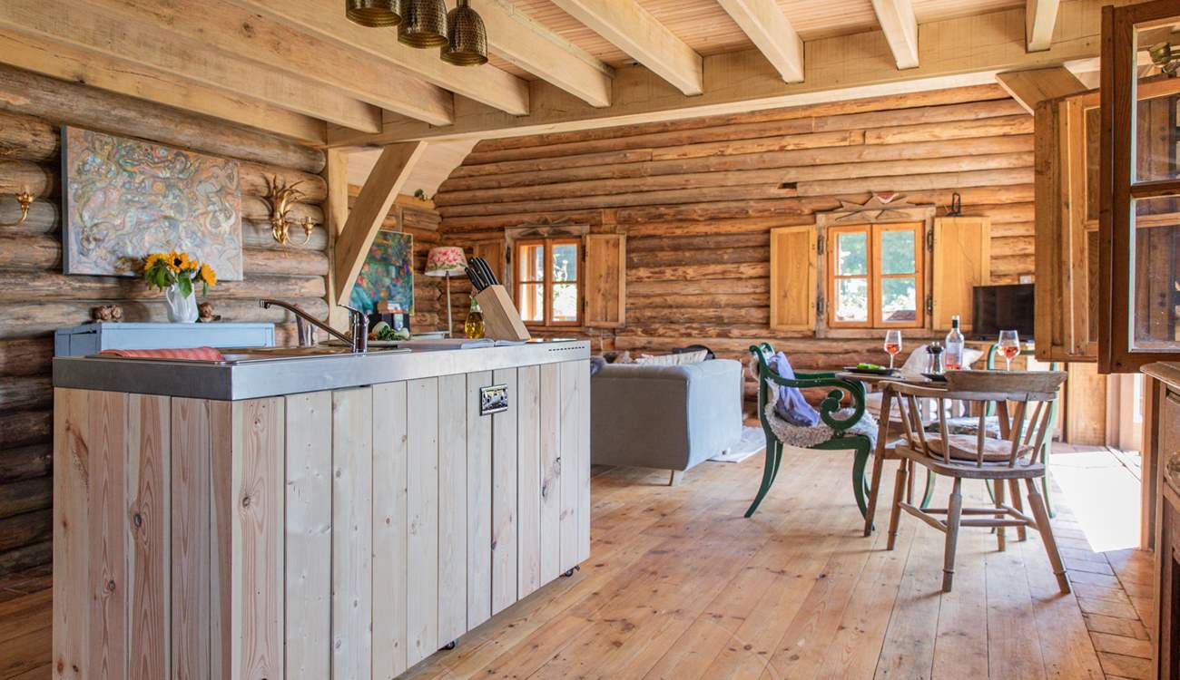 The free-standing kitchen is a sociable space.