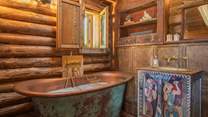 Long soaks in this gorgeous copper bath tub.