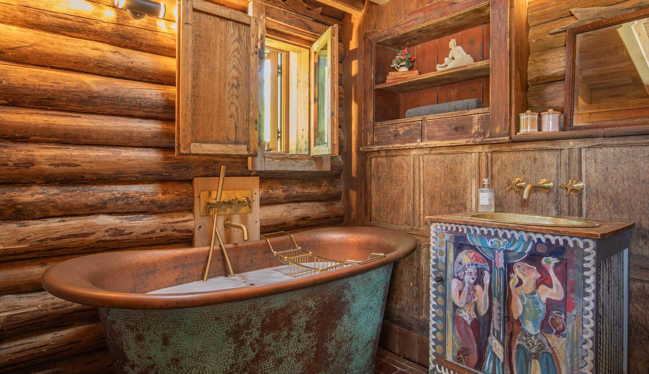 Long soaks in this gorgeous copper bath tub.