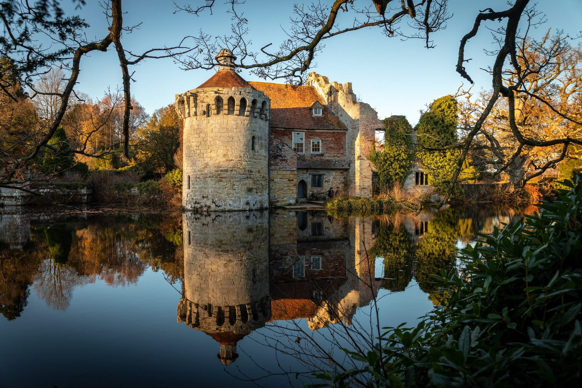 Visit Scotney Old Castle, a historic medieval manor house.