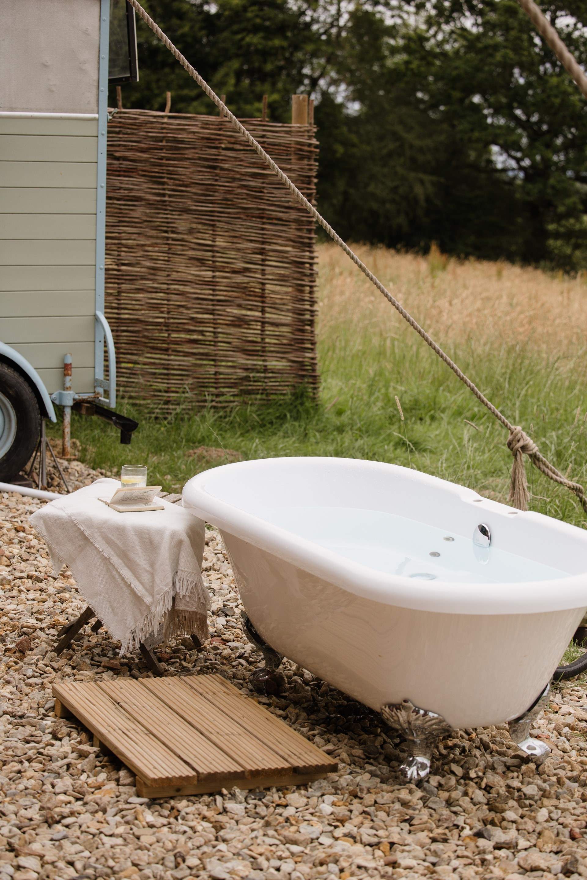 Sink into the wood-fired roll-top bath in your very own oasis of calm. 