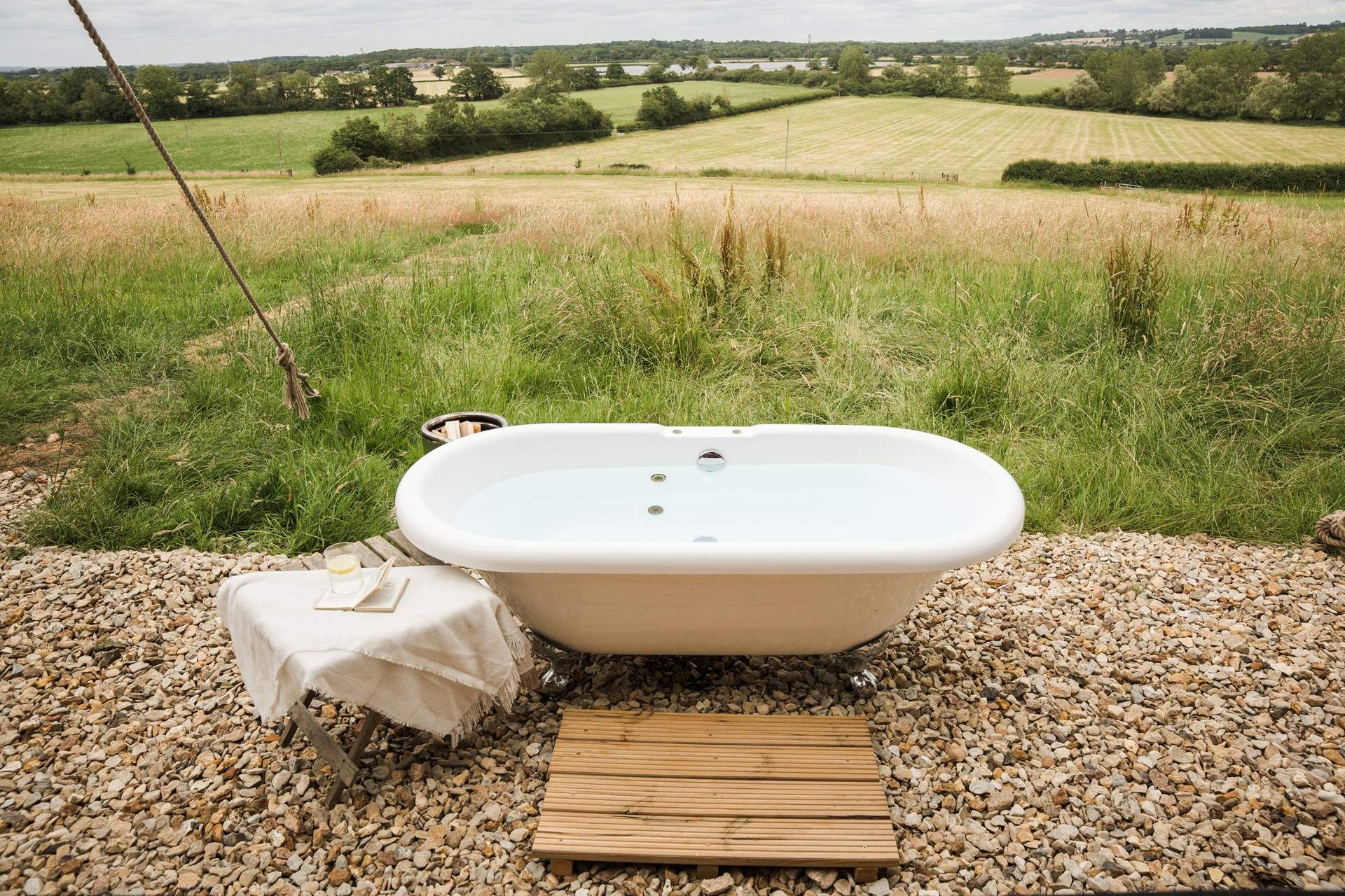 Bathe in luxury with rolling countryside vistas. 