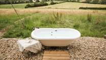 Bathe in luxury with rolling countryside vistas. 