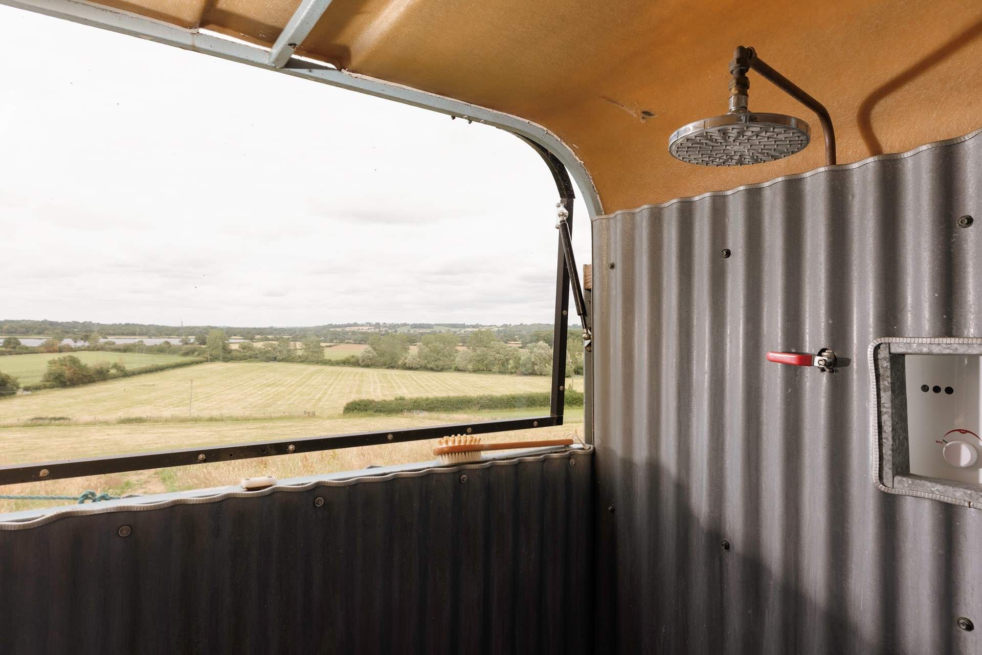 Take in the sweeping vistas from beneath the rainfall shower.