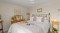 The two beautifully furnished bedrooms can be found on the ground floor.