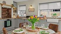 The dining-table provides the perfect setting for hearty breakfasts and holiday feasts.