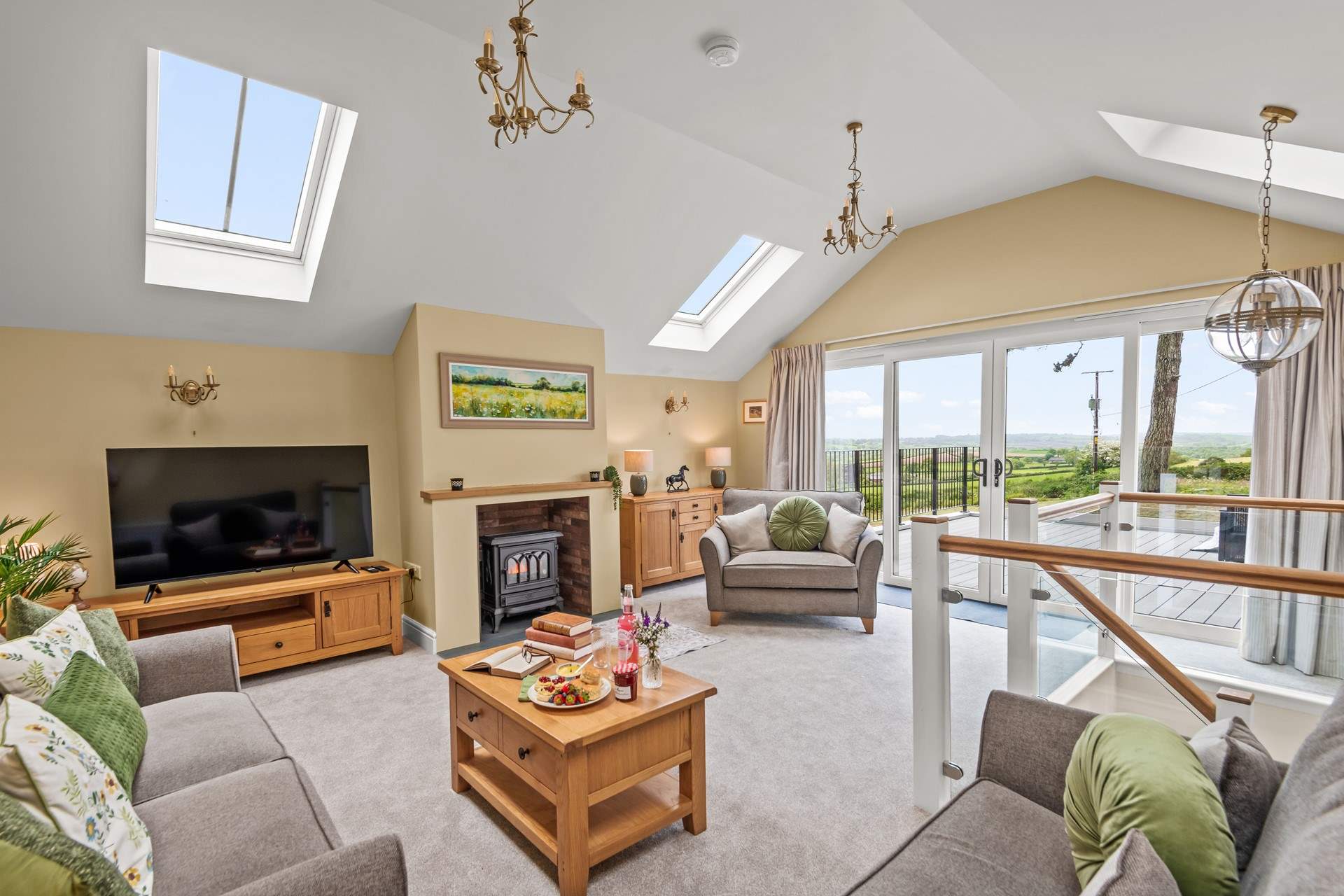 The sitting-room can be found on the first floor making the most of those fabulous views.
