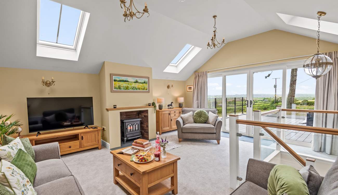 The sitting-room can be found on the first floor making the most of those fabulous views.