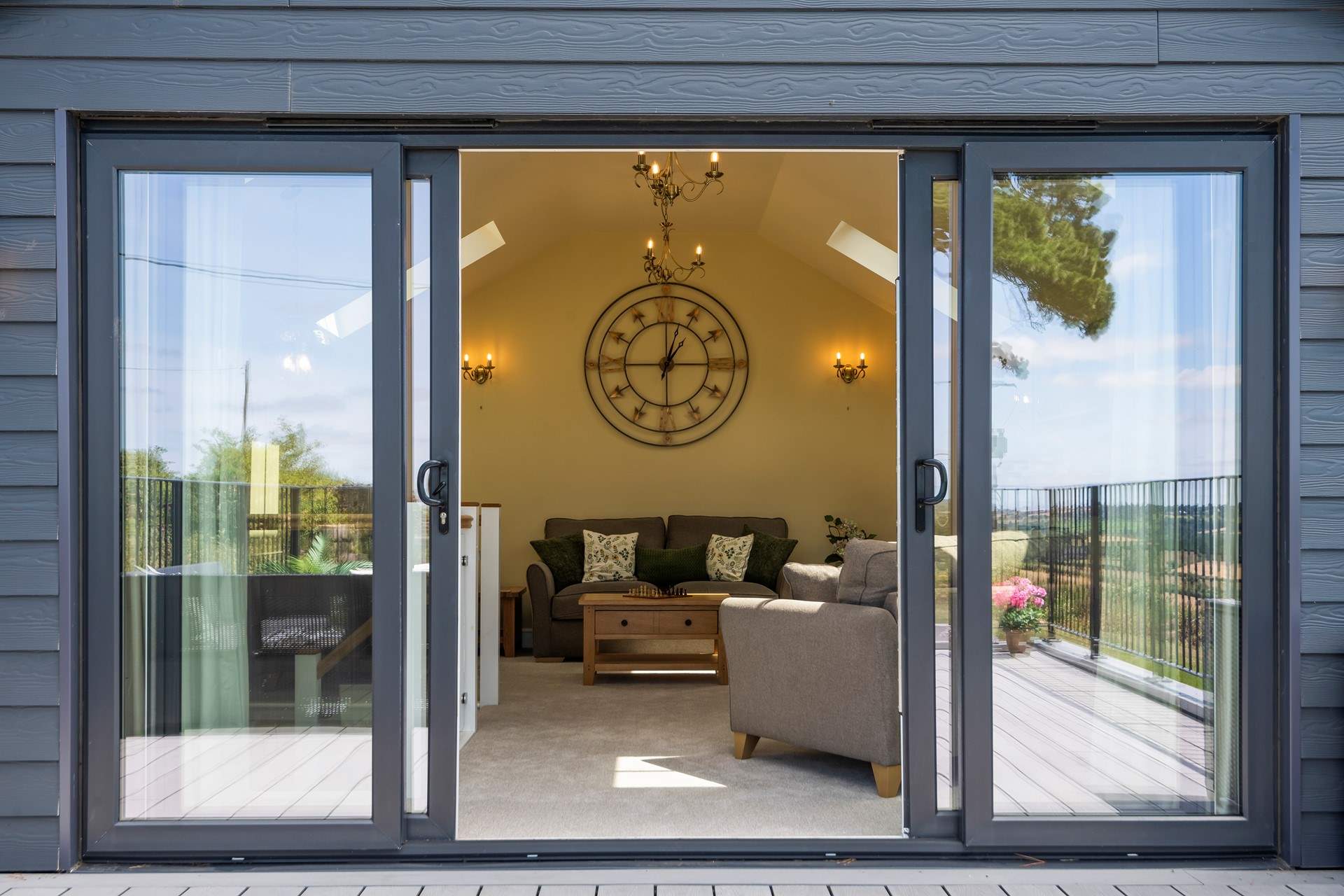 Whether you want to enjoy the great outdoors or relax indoors, this raised balcony is perfect.