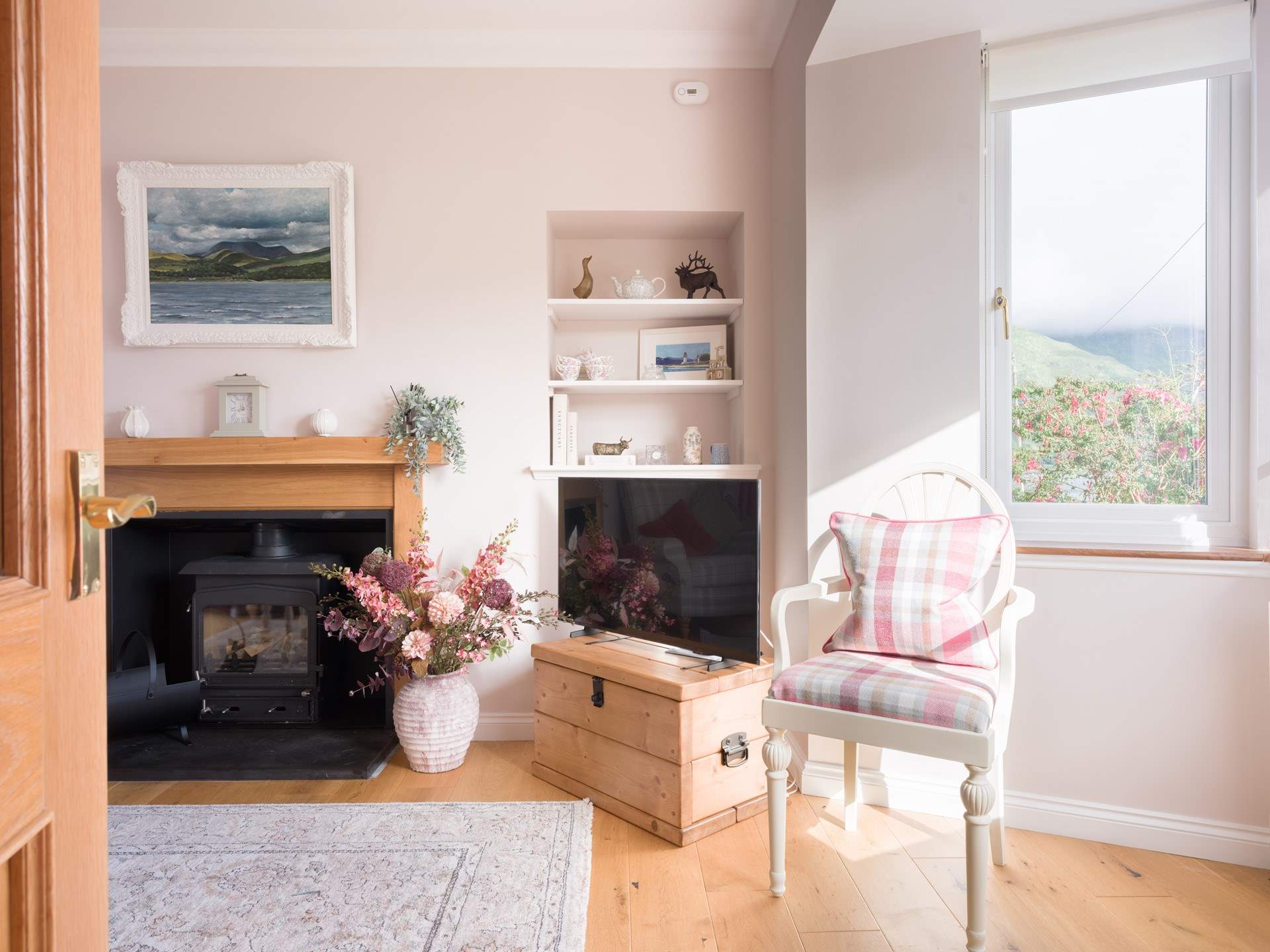 Sit awhile by the window with a good book.